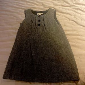 Cute dress in great condition. Good for colder weather as a thicker material.